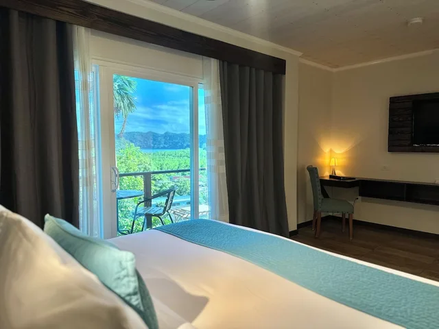 غرفة قياسية بسريرين منفصلين بإطلالة جزئية على البحر، Palau Central Hotel 7/10