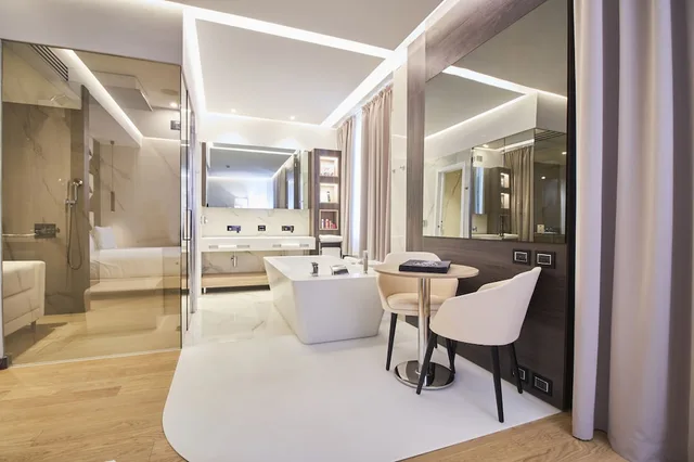 جناح ديلوكس بسرير كوين وسرير فردي، Ih Hotels Milano Ambasciatori 4/4