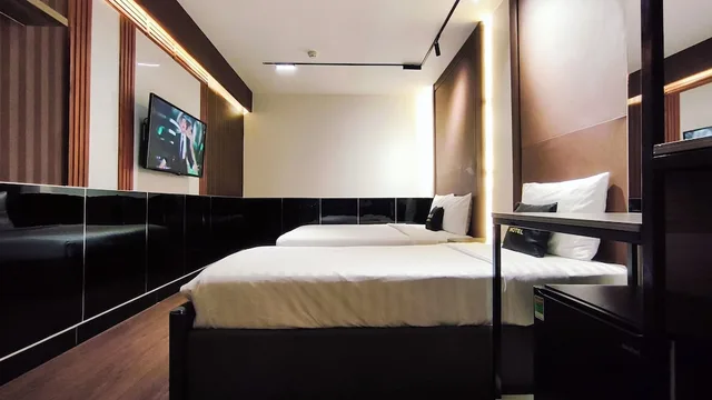 غرفة تنفيذية ثلاثية بسرير كوين وسرير فردي، Moc Huong Hotel 6/10