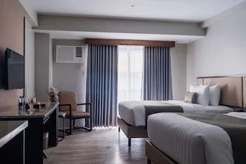 غرفة ديلوكس بسريرين مزدوجين بإطلالة على المسبح، Canyon Hotels Resorts Boracay 1/1