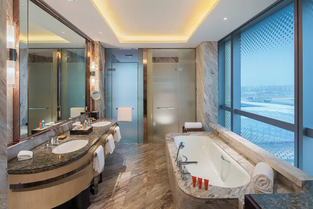 1 Bedroom, Single Bed, Dining Area, Kitchen، CROWNE PLAZA DALIAN SPORTS CENTER 9/9
