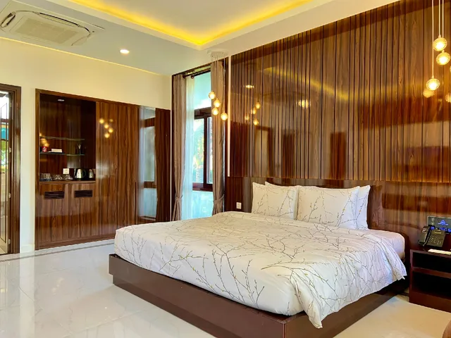 جناح عائلي بسرير كينج وسريرين منفصلين بإطلالة على البحر، Carmelina Beach Resort 2/4