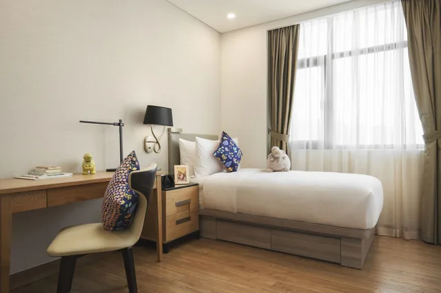 شقة ديلوكس بسريرين كينج وسرير فردي بـ3 غرف نوم، Oakwood Residence Saigon 3/6