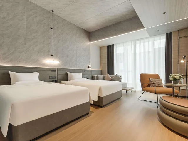 غرفة تنفيذية بسريرين منفصلين وسريرين مزدوجين مع أريكة، Novotel Yinchuan Lanxigu 2/5