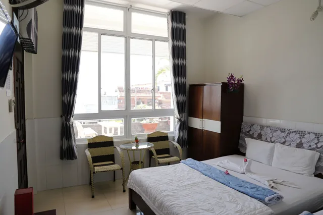 غرفة رباعية بسريرين مزدوجين، Minh Hung Hotel 6/8