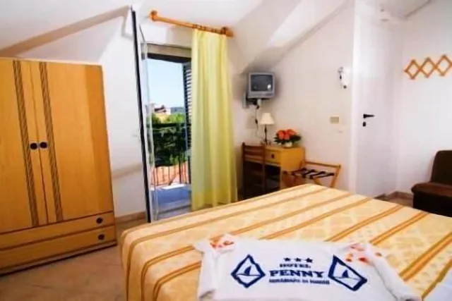 غرفة عائلية ثلاثية بسرير مزدوج وسرير فردي، Hotel Penny 1/2