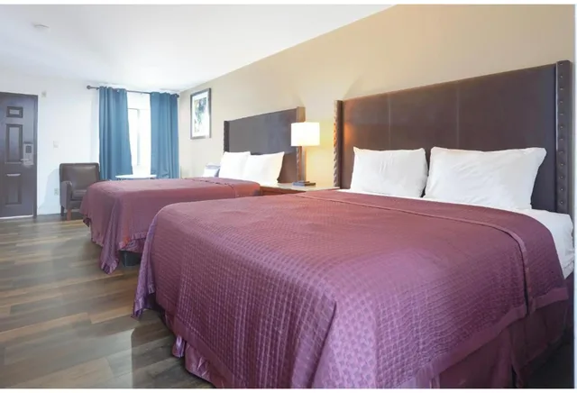 2 Full Beds Accessible Non - Smoking، Budget inn by Oyo San Augustine 1/4