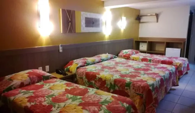 غرفة رباعية بسرير مزدوج وسريرين منفصلين بإطلالة على البحر، Varandas do Atoll Hotel 1/6