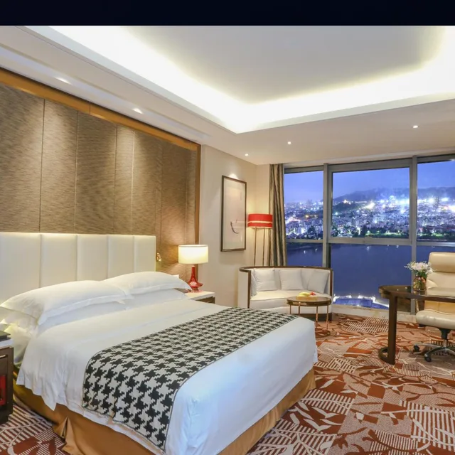 غرفة تنفيذية بسرير كوين بإطلالة على النهر، Yiwu Shangcheng Hotel 1/5