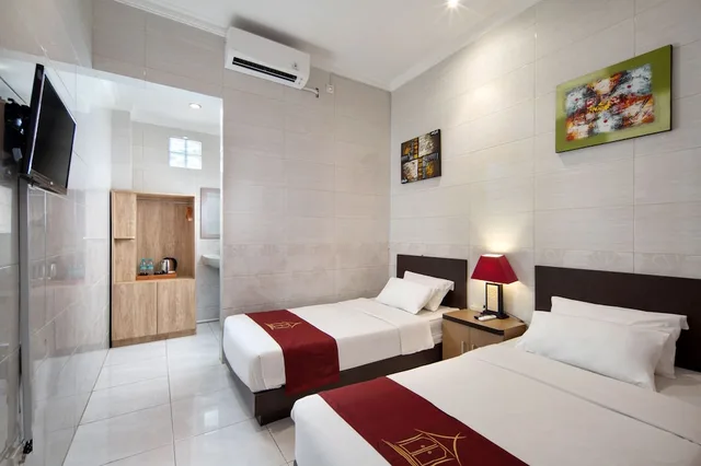 Deluxe, Twin Beds, Pool Side، Angkul Angkul Beach Inn Kuta 3/9
