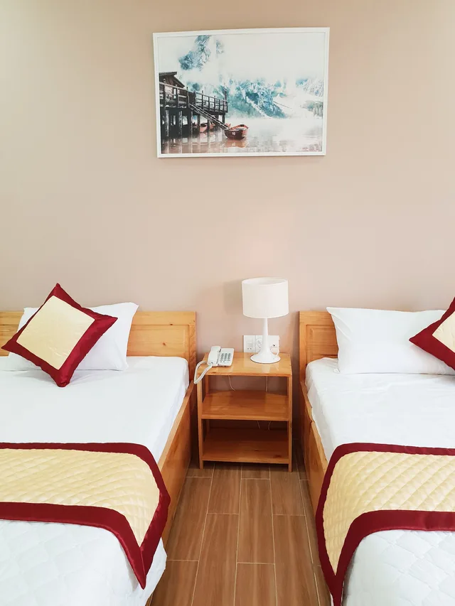 غرفة ديلوكس بسرير كوين وسرير فردي، Quy Nhon Center Hotel 3/6