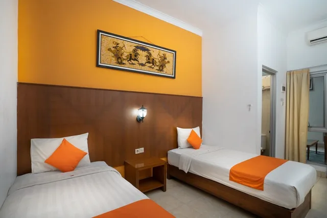 غرفة سوبيريور بسريرين منفصلين، Hotel Poncowinatan - Tugu 1/2