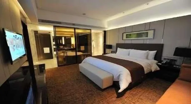 غرفة بزنس كلوب بسرير كينج للمدخنين، Wyndham Xuzhou East 1/1