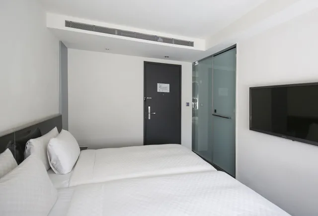 غرفة ديلوكس ثلاثية بسرير مزدوج وسرير فردي بإطلالة على المدينة بحوض استحمام، CityInn Hotel Plus Taichung Station Branch 1/10