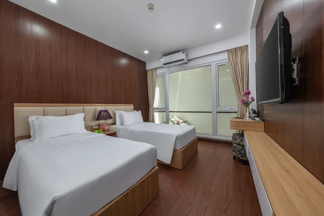 غرفة ديلوكس بسريرين منفصلين، Millennium Hanoi Hotel 1/8