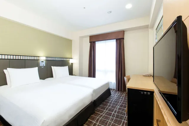غرفة بسريرين منفصلين، Doubletree By Hilton Hotel Naha 1/2