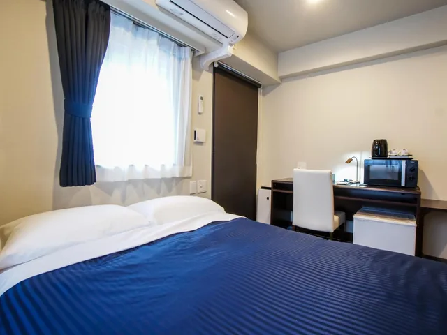 غرفة بسرير نصف مزدوج، Hotel Livemax Umeda Douyama 2/9