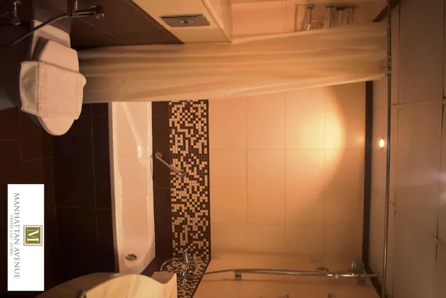 جناح ديلوكس بسرير كينج، Manhattan Avenue Hotel 6/6