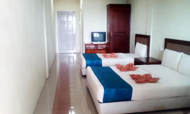 غرفة سوبيريور بسرير مزدوج وسرير فردي، Arwana Inn 1/2