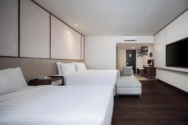 جناح عائلي بسرير كوين وسرير فردي، Aston Kuta Hotel and Residence 1/3