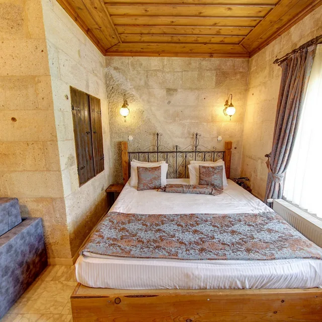 غرفة جونيور بسرير كينج وسرير فردي، Roma Cave Suite Hotel 2/10