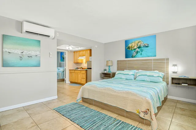 جناح ديلوكس بسرير كينج وسرير كوين بغرفتي نوم بمطبخ، Latitude 26 Waterfront Resort & Marina 2/9