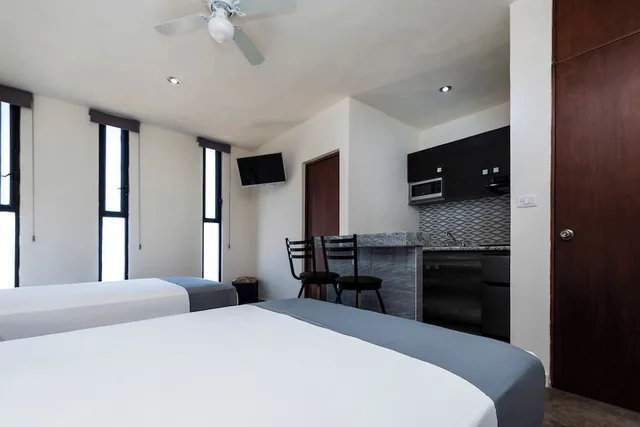 غرفة ديلوكس بسريرين مزدوجين، Capital O Hotel Joyma Suites, San Luis 2/7