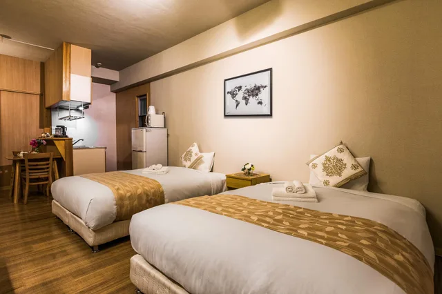 غرفة بسريرين منفصلين، Residence Hotel Naha West 1/3