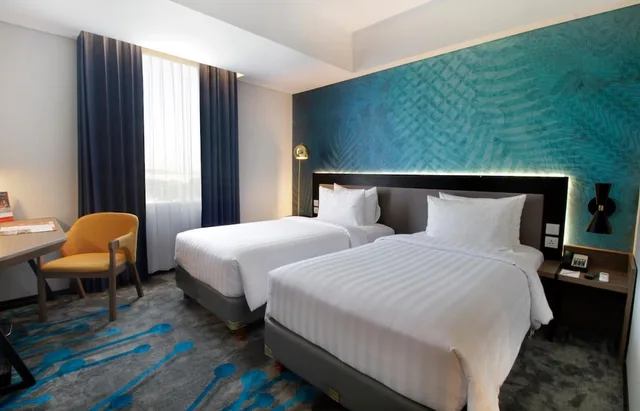 غرفة ديلوكس بسريرين منفصلين للمدخنين، Swiss-Belinn Airport Surabaya 3/4
