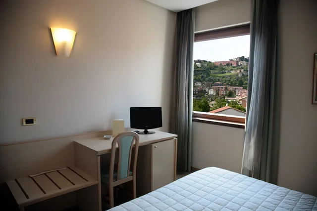 غرفة متصلة رباعية بسريرين كوين، HOTEL BASSETTO 2/2