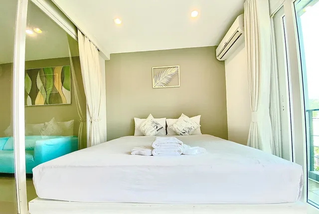 غرفة ديلوكس بسرير كينج، THE PALMS RESIDENCE 1/3