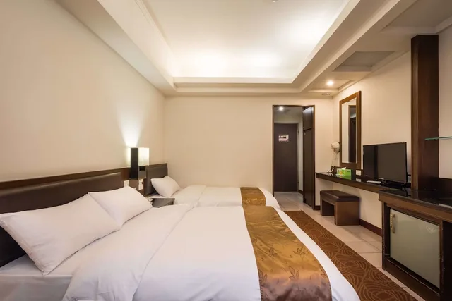 غرفة قياسية ثلاثية بسرير مزدوج وسرير فردي، Twinstar Hotel 1/3