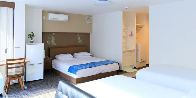 غرفة عائلية بسريرين منفصلين وسرير كينج وسرير فردي مع أريكة، Sakuragawa Riverside Hotel 5/10