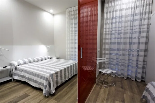 غرفة عائلية بسرير مزدوج وسرير فردي بغرفتي نوم، Hotel Aurea 2/3