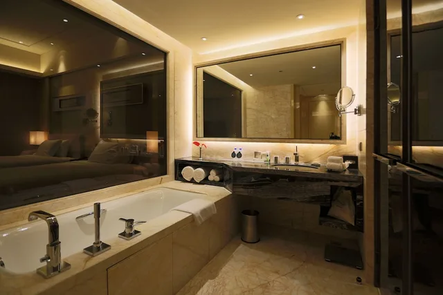 جناح رئاسي بسرير كينج، HILTON DALIAN 7/8