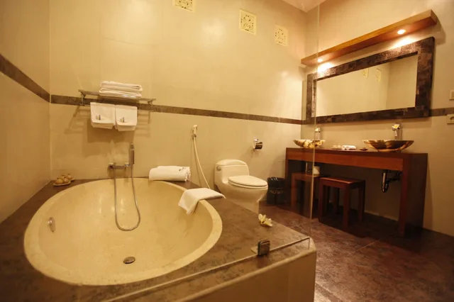 جناح بسرير مزدوج وسريرين منفصلين بغرفتي نوم، Puri Dajuma Beach Eco Resort & Spa 4/4