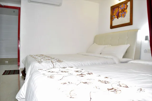 غرفة غراند رباعية بسريرين كوين، S Rose Hotel 2/3
