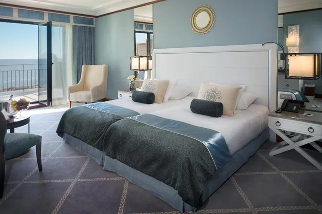 Seaview Retreat Double Room 3 pax, Grande Real Villa Italia Hotel and Spa 3/8