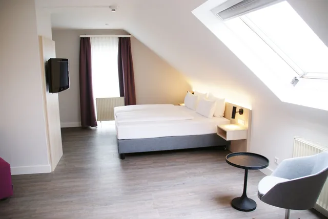 غرفة سوبيريور بسرير كوين، Taste Hotel Hockenheim 1/3