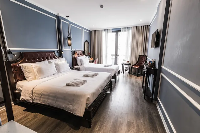 غرفة عائلية ثلاثية بسرير كوين وسرير فردي بإطلالة على المدينة بشرفة، Suddha Boutique Hotel 4/10