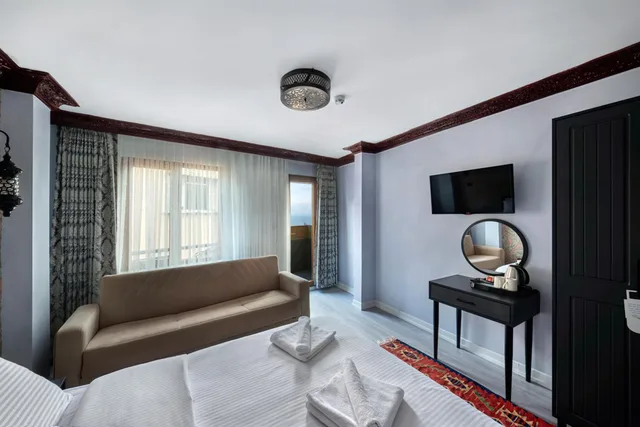 غرفة ديلوكس ثلاثية بإطلالة جزئية على البحر، Mytra Hotel 8/10