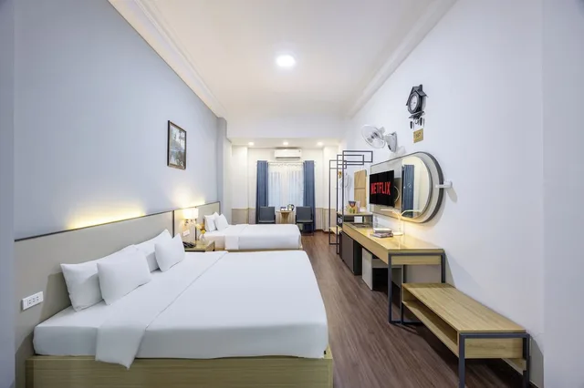 غرفة ديلوكس عائلية بسرير كوين وسرير فردي، A25 Hotel - 35 Mac Thi Buoi 5/10