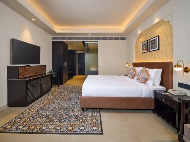 غرفة بريميوم بسرير مزدوج بشرفة، Pride Amber Villas Resort 1/1