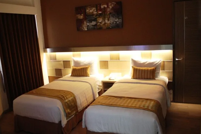 غرفة ديلوكس بسريرين منفصلين، RUBY HOTEL SYARIAH 1/3