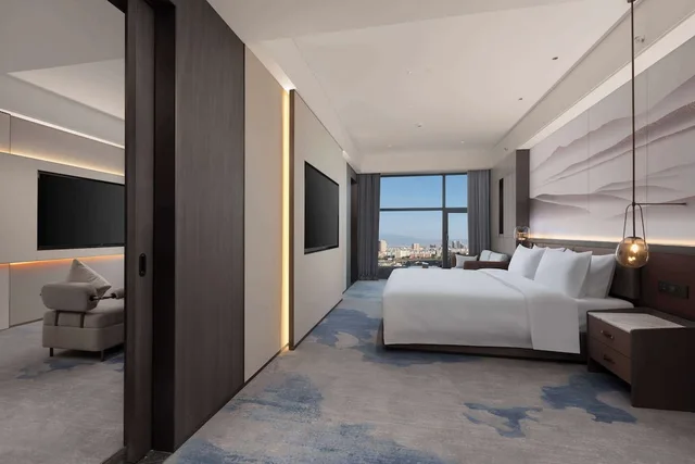 جناح تنفيذي بسرير كينج مع أريكة، Wyndham Qujing Luliang 1/1