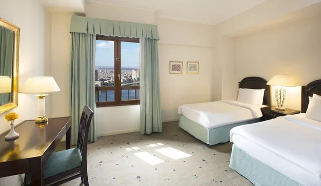 جناح ملكي بسرير كينج وسرير فردي بإطلالة على النهر، Cairo World Trade Center Hotel and Residences 3/5