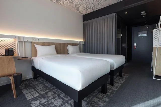 غرفة بريميوم بسرير كوين، ibis Almaty Jetisu 3/7
