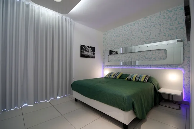 2 Bedrooms, Design, Apartment, Double and Twin Beds, Partial Lake View, Garden Area، Golfo Gabella 1/9