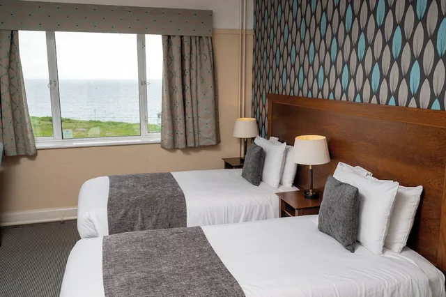 غرفة بسريرين منفصلين، Commodore Hotel 2/5