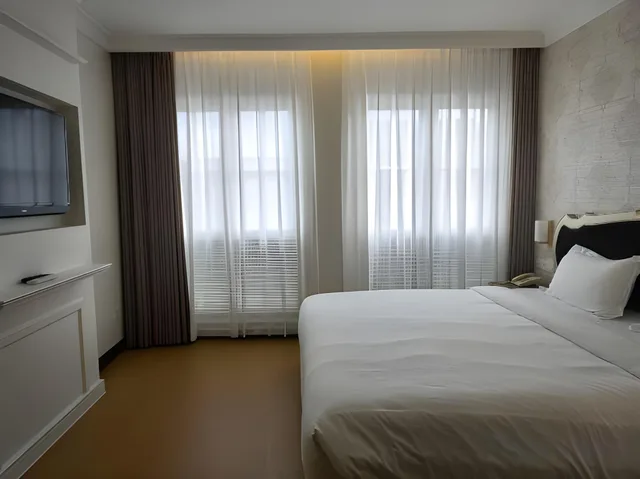 جناح عائلي بسرير كينج وسرير بطابقين، RC Hotel 2/3